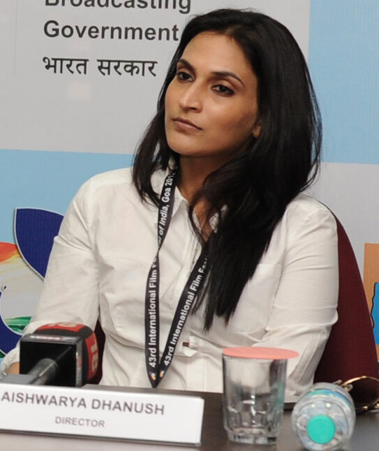 Aishwarya Rajinikanth at a press conference during the 43rd International Film Festival of India, seated behind a nameplate reading Director